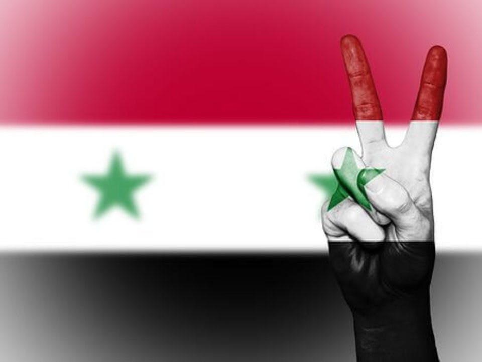 シリアの国旗にピース