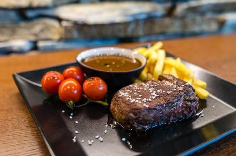 Large steak with french fries and red fruits 1352262  1 