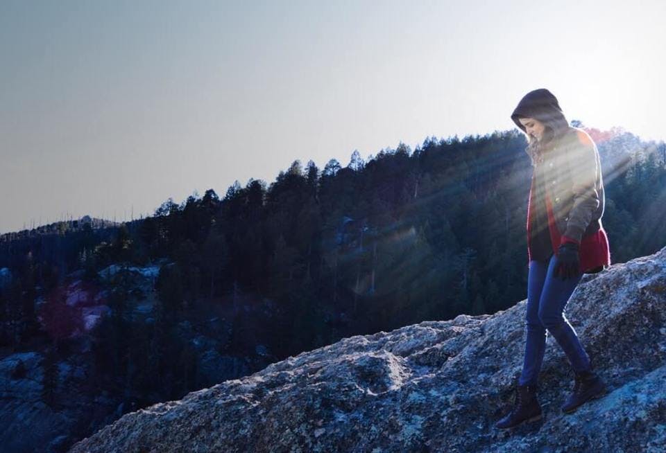 Large woman walking on mountain 786095  1 